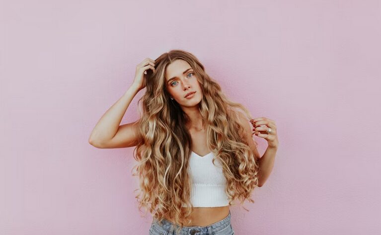 holding curly hair